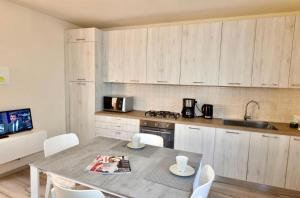 A kitchen or kitchenette at Casa Caterina - Riva di Solto - Iseo Lake