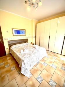 Postel nebo postele na pokoji v ubytování Alex Room