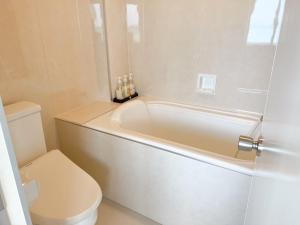 Koupelna v ubytování Golden Sun Beach Hotel - Vacation STAY 51362v