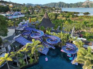 an aerial view of a water park with slides at Hiker's Camp at Toya Devasya in Kintamani