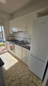 Η κουζίνα ή μικρή κουζίνα στο Apartamentos La Goleta 1
