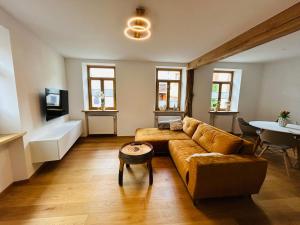 a living room with a couch and a table at Ferienhaus Haisel Vier in Sankt Martin