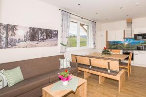 Area soggiorno di Appartements AUSZEIT with private SPA