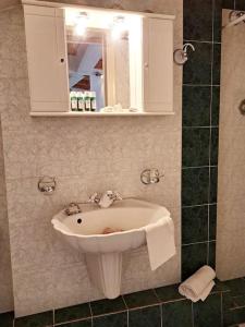 A bathroom at Moonstone Seafront Suite