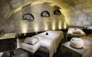 Postel nebo postele na pokoji v ubytování La Hostería Boutique Hotel