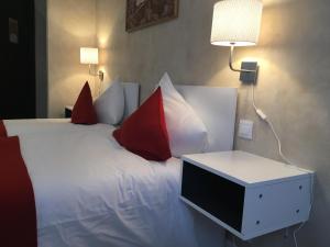 Postel nebo postele na pokoji v ubytování Csiki Hotel