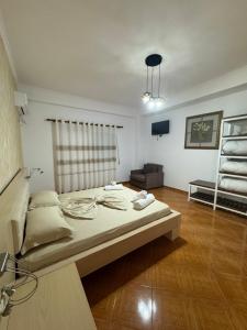 Postel nebo postele na pokoji v ubytování Hotel Frida