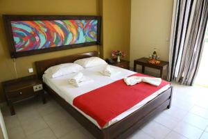 Posteľ alebo postele v izbe v ubytovaní Porto Plazza Hotel