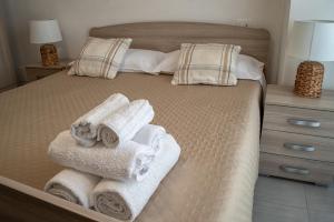 Postel nebo postele na pokoji v ubytování B&B Santa Filomena