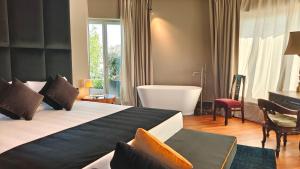 Voodi või voodid majutusasutuse Triviho Hotel toas