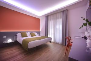Postel nebo postele na pokoji v ubytování Santantonioresort