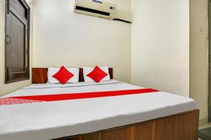 Ένα ή περισσότερα κρεβάτια σε δωμάτιο στο Wave Inn Guest House