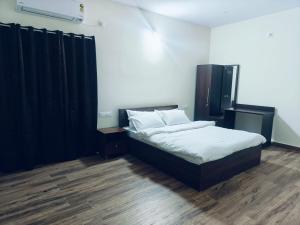 Letto o letti in una camera di The Nest