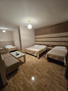 Letto o letti in una camera di Hotel 045