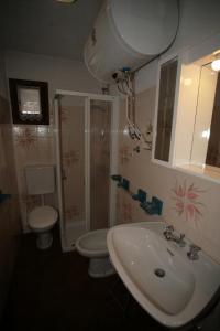 Phòng tắm tại Appartamento Doleda