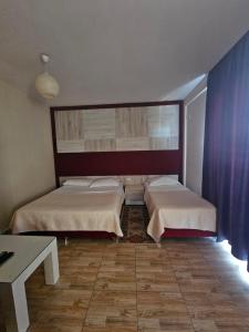 Letto o letti in una camera di Hotel 045