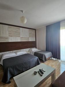 Letto o letti in una camera di Hotel 045