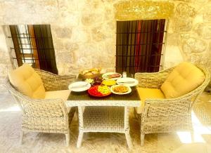 Χώρος καθιστικού στο Arev HOTEL