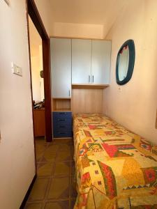 En eller flere senge i et værelse på Casa Letizia + 2 billeder