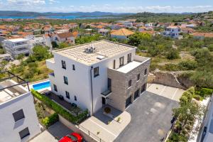an aerial view of a white house at Luxury apartment Mon Soleil 2 in Murter