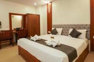 Afbeelding uit fotogalerij van Royal Plaza City in Kozhikode