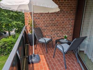 Balkón nebo terasa v ubytování Apartment mit Balkon und Pool, zentral am Waldrand