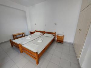 Postel nebo postele na pokoji v ubytování ΕΙΡΗΝΗ Studios