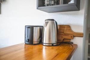 Kaffe- og tefaciliteter på Maison L oree du Golf