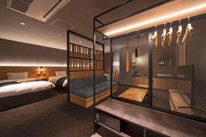 Voodi või voodid majutusasutuse hotel around TAKAYAMA, Ascend Hotel Collection toas