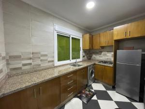 Kuchyň nebo kuchyňský kout v ubytování Dina Apartments