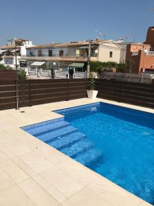 a swimming pool on the roof of a building at Luxury Villa Torrevieja With Swimmingpool in Torrevieja