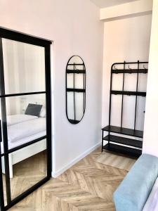Posteľ alebo postele v izbe v ubytovaní Apartamenty "CENTRUM" Mrągowo Mazury + 22 fotografií