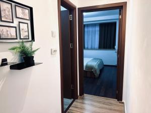 Postel nebo postele na pokoji v ubytování UNDE Home