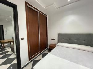 Postel nebo postele na pokoji v ubytování Dina Apartments