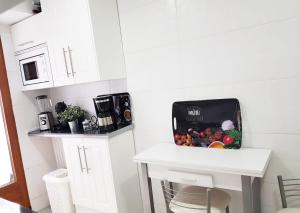 Kuchyňa alebo kuchynka v ubytovaní Hervas Centro Apartamento IDEAL FAMILIAS 6 adultos y 2 niños-