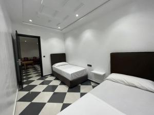 Postel nebo postele na pokoji v ubytování Dina Apartments