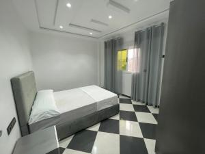 Postel nebo postele na pokoji v ubytování Dina Apartments