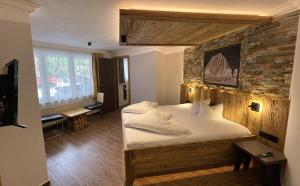 Posteľ alebo postele v izbe v ubytovaní Hotel Garni Ida