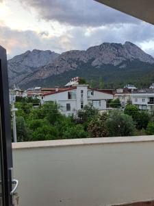 a view of a city with mountains in the background at Villa Nimo 5 plus 1 for Rent with Private Pool in Antalya
