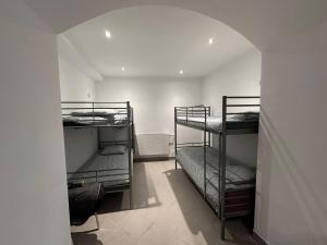 Postel nebo postele na pokoji v ubytování Gołębia Hostel