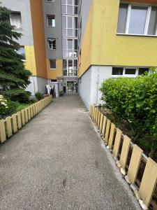 a walkway in front of a building at 3BR near Center with Parking in Bratislava
