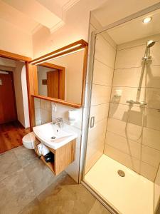 Kúpeľňa v ubytovaní Hotel Pass Lueg