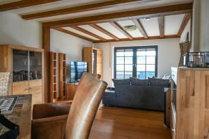 Posezení v ubytování Ferienwohnung Boxenstopp