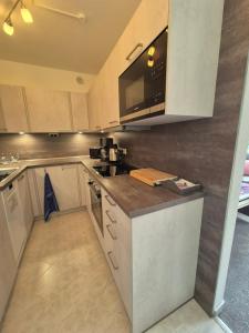 Kuchyň nebo kuchyňský kout v ubytování Ferienwohnung Heinze