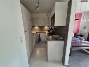 Kuchyň nebo kuchyňský kout v ubytování Ferienwohnung Heinze