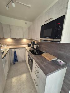 Kuchyň nebo kuchyňský kout v ubytování Ferienwohnung Heinze