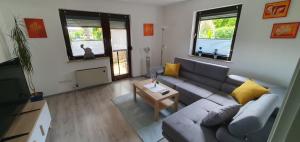 Ruang duduk di Ferienwohnung Rettersheim Mainspessart