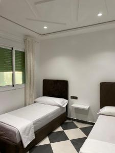 Postel nebo postele na pokoji v ubytování Dina Apartments