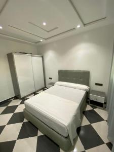 Postel nebo postele na pokoji v ubytování Dina Apartments