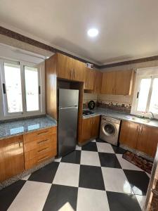 Kuchyň nebo kuchyňský kout v ubytování Dina Apartments